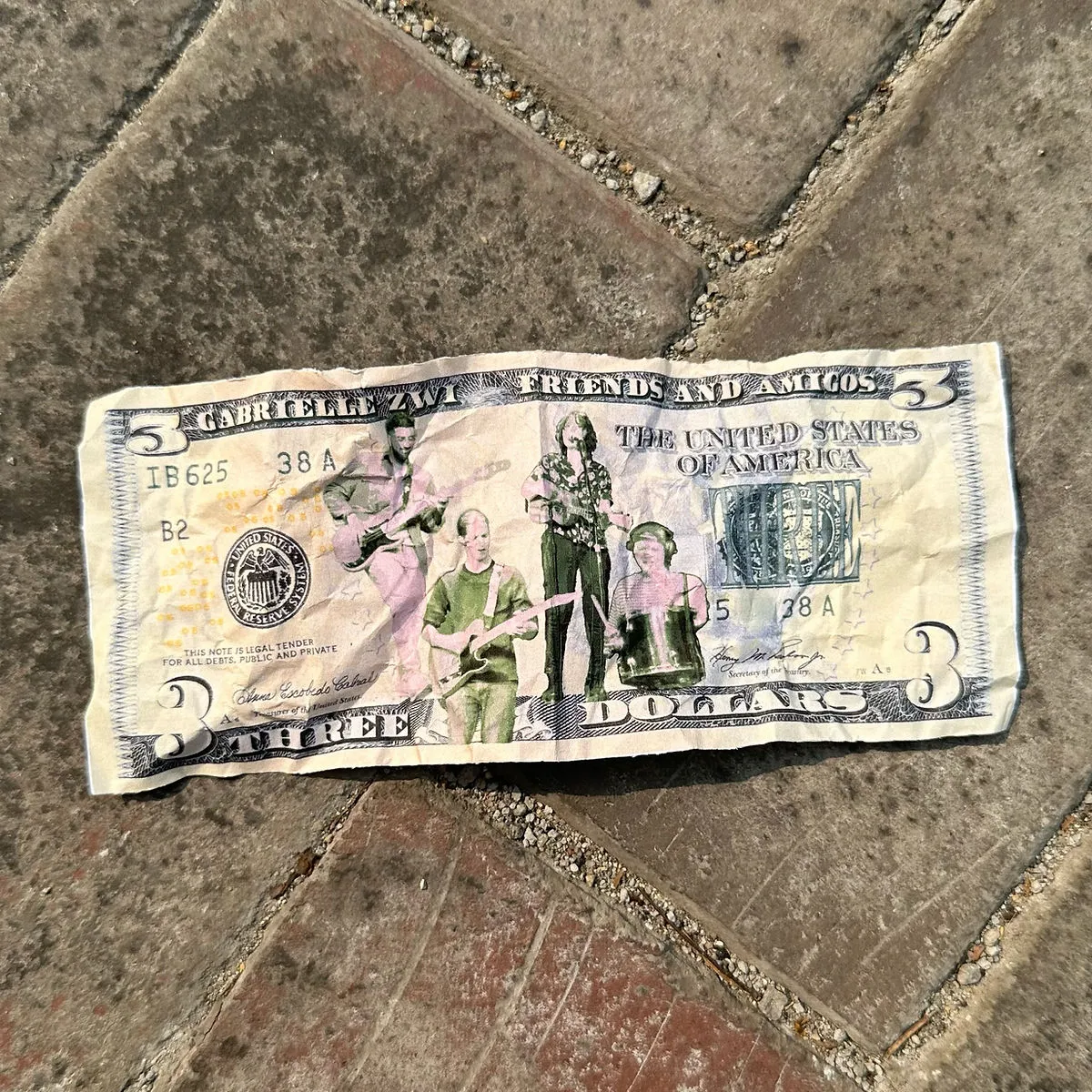 Gabrielle Zwi - "Three Dollar Bill" album art depicts Gabrielle Zwi and her band on the face of a U.S. three dollar bill.